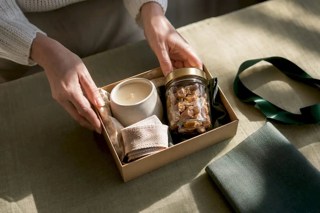 Thoughtful thank-you gifts arranged on linen