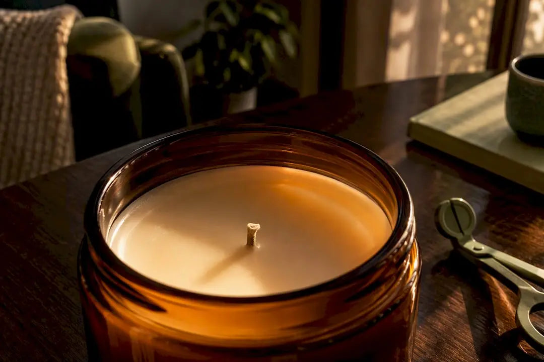 Close view of amber candle melt pool